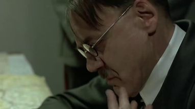 Blurred hitler taking off glasses meme template