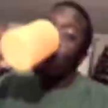 Blurred Black guy drinks orange juice and dies meme template