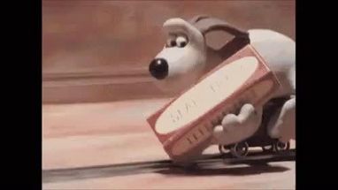 Blurred Gromit placing tracks meme template