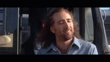 Blurred Nicolas Cage hair in wind meme template