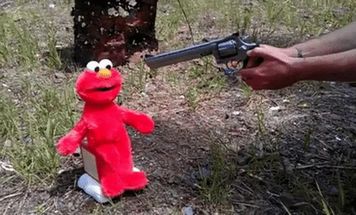 Blurred Elmo shooting head puppet meme template