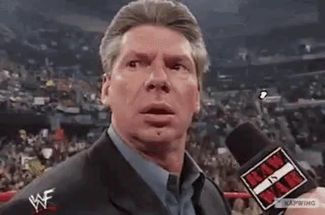 Blurred Vince mcmahon reveal meme template